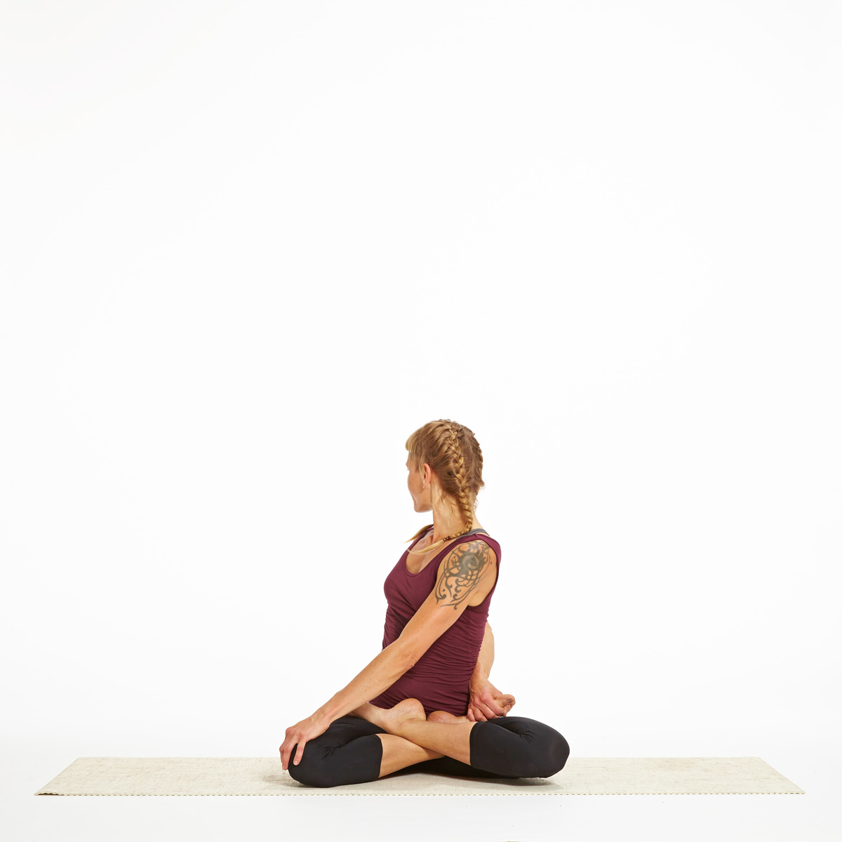 Ardha Matsyendrasana (Seated Twist): Lengthen Your Spine | Hugger Mugger  Yoga